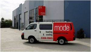 Mode Heating and Cooling Van outside Office